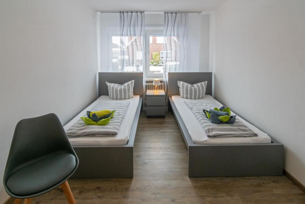 Postel nebo postele na pokoji v ubytování Ferienhaus Heimatdock