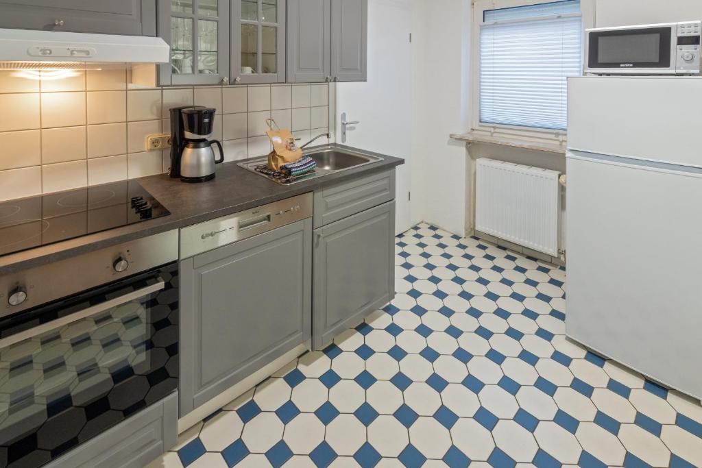 Kuchyň nebo kuchyňský kout v ubytování Ferienhaus Heimatdock
