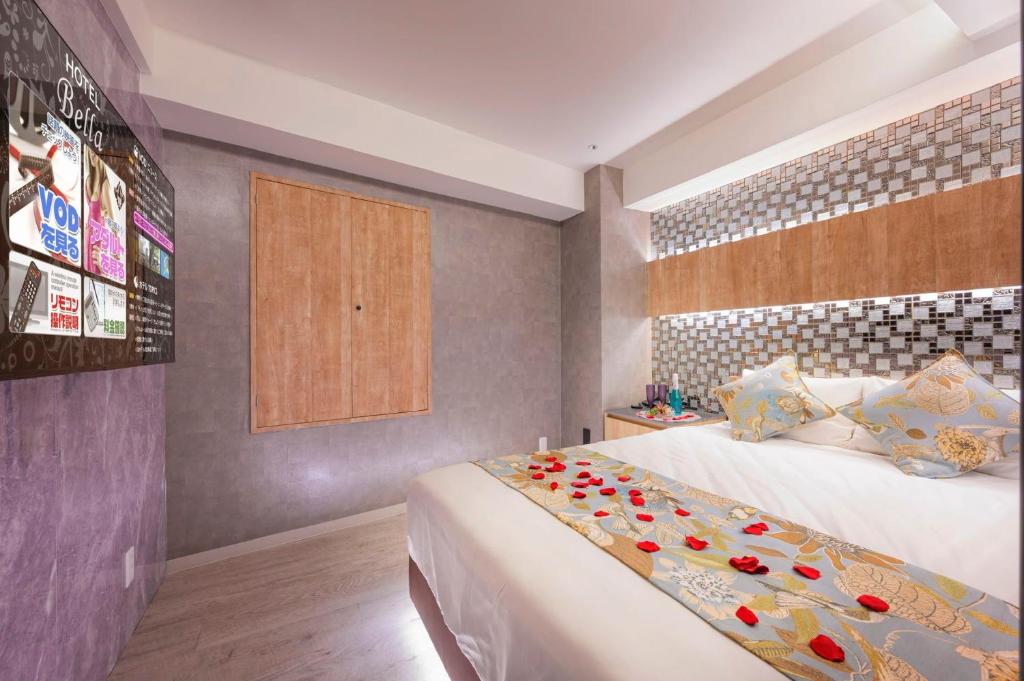 Postel nebo postele na pokoji v ubytování Exquisite business hotel Bella