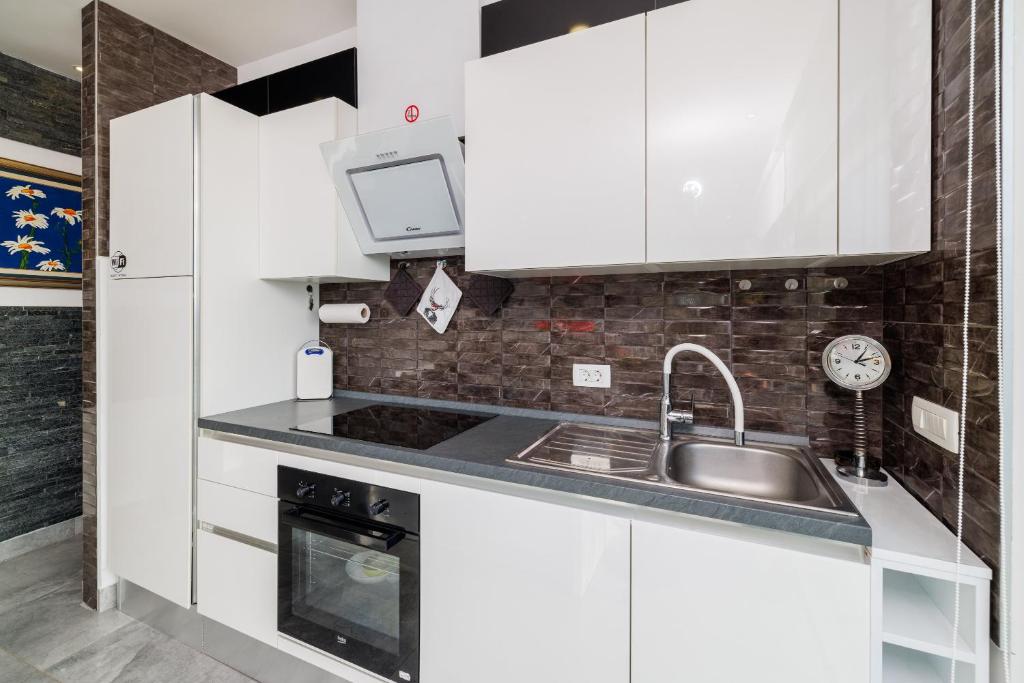 Kuchyň nebo kuchyňský kout v ubytování Holiday home Hojka 2
