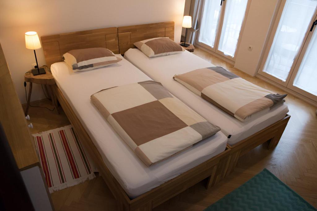 Postel nebo postele na pokoji v ubytování Bed & Breakfast Dvorec