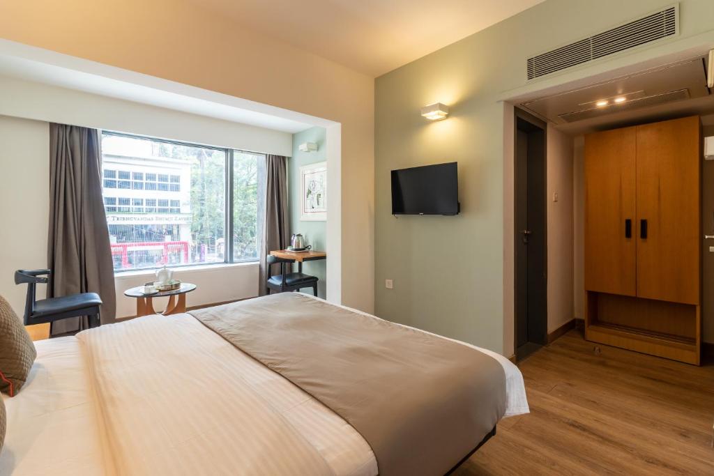 Postel nebo postele na pokoji v ubytování HOTEL LE ROYCE