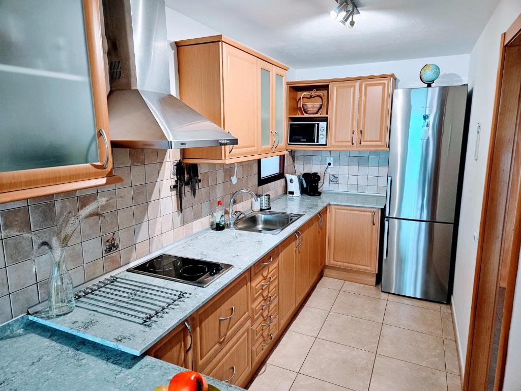 Kuchyň nebo kuchyňský kout v ubytování Residence Ocean View