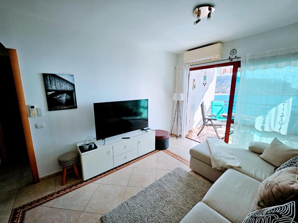 TV a/nebo společenská místnost v ubytování Residence Ocean View