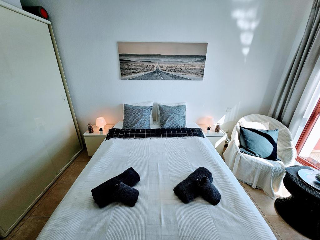 Postel nebo postele na pokoji v ubytování Residence Ocean View