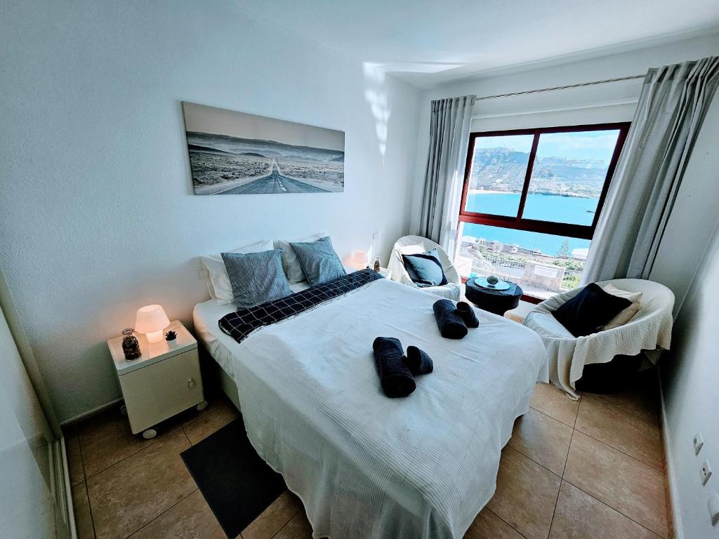 Postel nebo postele na pokoji v ubytování Residence Ocean View