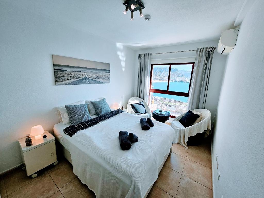 Postel nebo postele na pokoji v ubytování Residence Ocean View