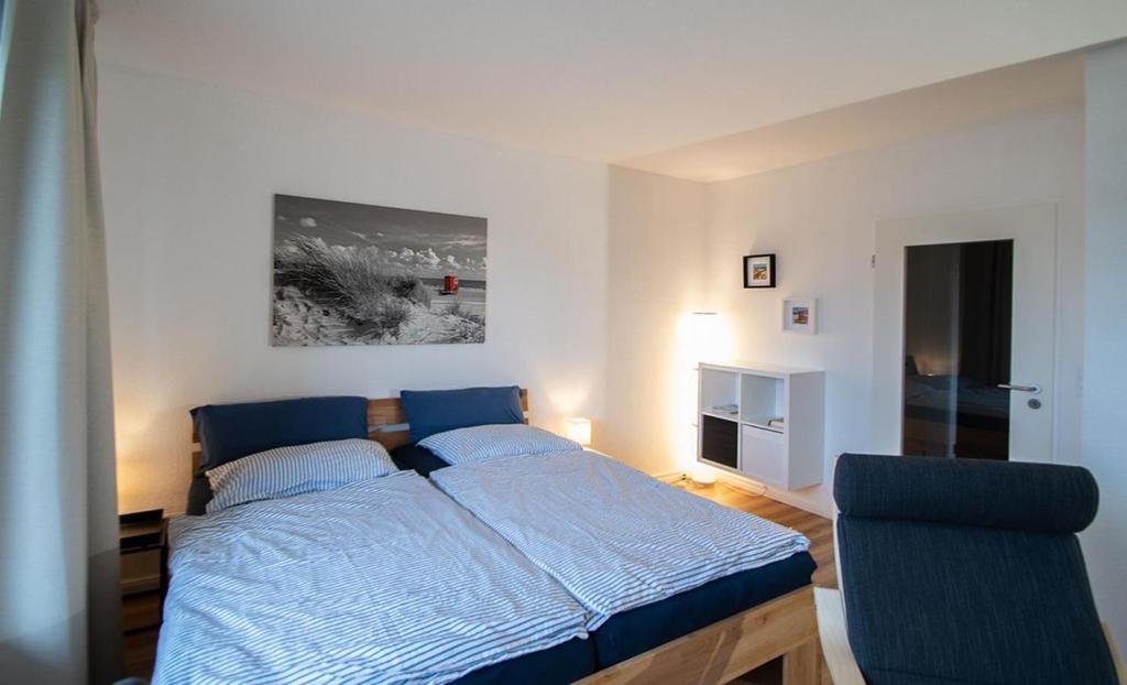 Postel nebo postele na pokoji v ubytování Ruhige See