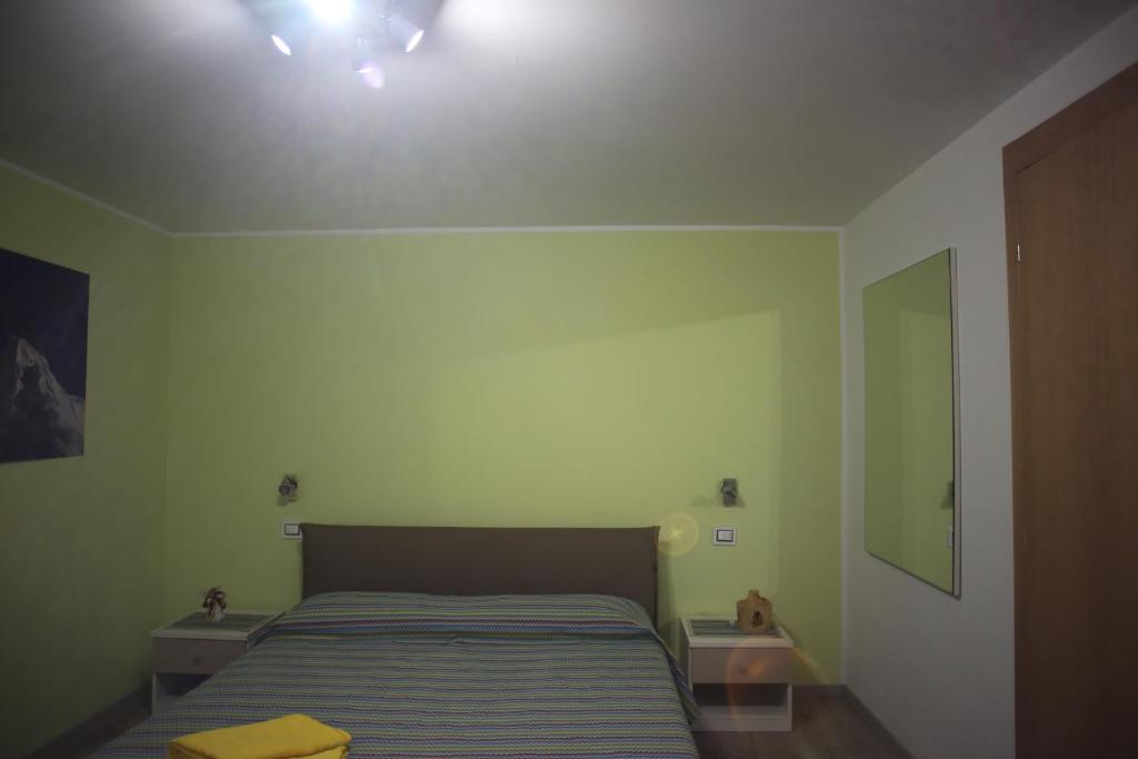 Säng eller sängar i ett rum på Dal Nini