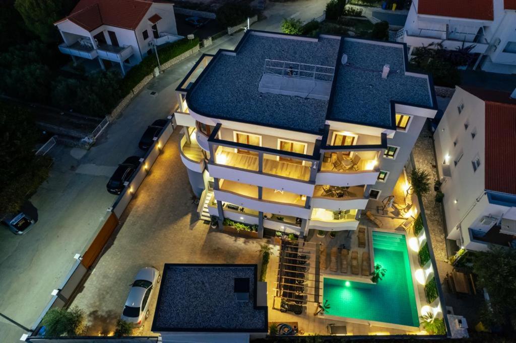 an aerial view of a building at night at Villa Mariella in Novalja