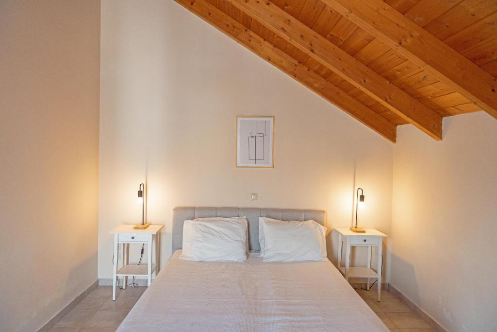 Postel nebo postele na pokoji v ubytování Helianthus Apartments