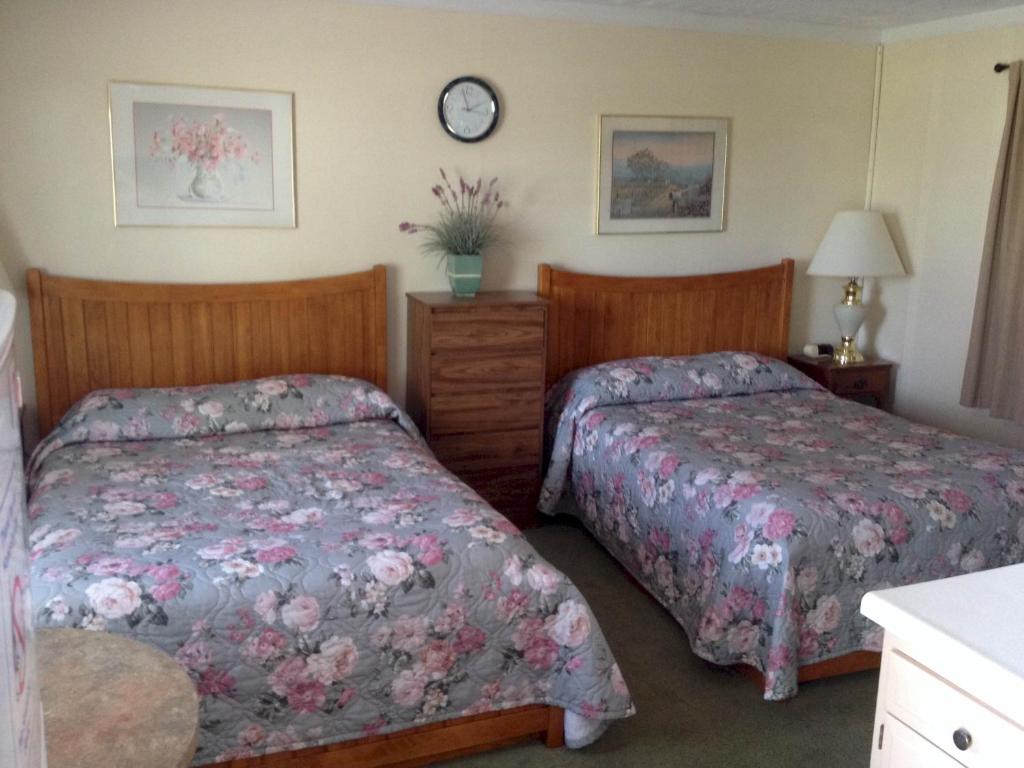 Postel nebo postele na pokoji v ubytování Lakeview Motel & Apartments