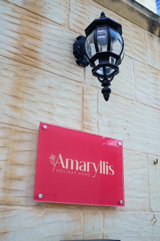 Certificato, attestato, insegna o altro documento esposto da Amaryllis Holiday Home