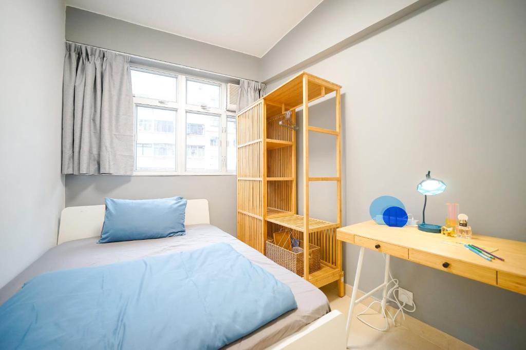 Postel nebo postele na pokoji v ubytování Student Accommodation - 292 Hennessy Road