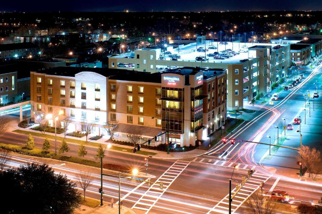 a city at night with street lights and buildings at SpringHill Suites Norfolk Old Dominion University in Norfolk