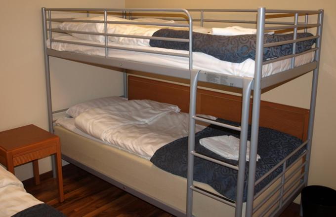 Postel nebo postele na pokoji v ubytování Star Hostel