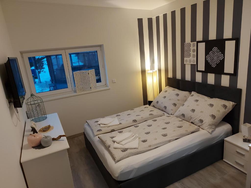 Postel nebo postele na pokoji v ubytování Villa Stefaner