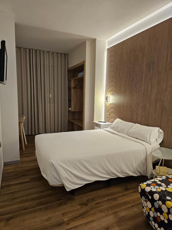 Postel nebo postele na pokoji v ubytování Hotel Villasegura