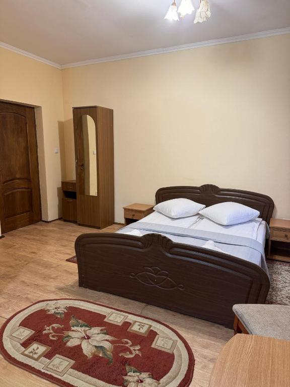 Postel nebo postele na pokoji v ubytování Лаціо