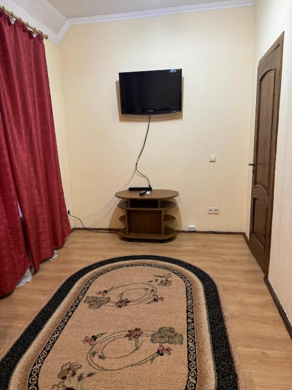 TV a/nebo společenská místnost v ubytování Лаціо