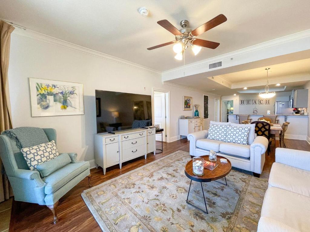a living room with a couch and a table at 507 Holiday Isle 507 in Dauphin Island