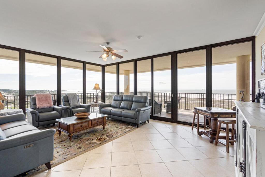 a living room with a view of the ocean at 701 Holiday Isle 701 in Dauphin Island
