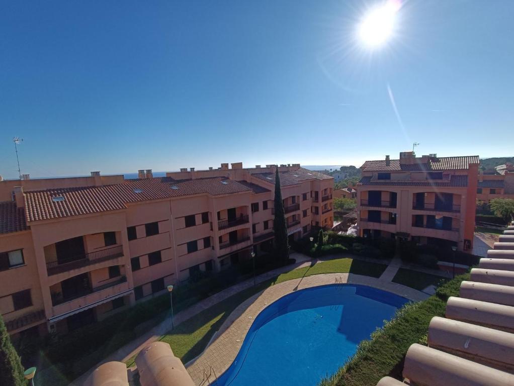 a view from the balcony of a building with a swimming pool at Bonito Dúplex Msj 83 in Calafat
