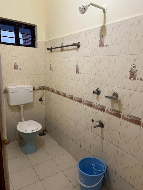 Koupelna v ubytování Mukalel Tourist Home