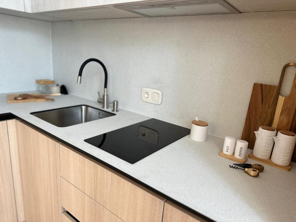 Kuchyň nebo kuchyňský kout v ubytování Other Apartments