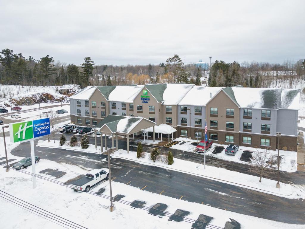 an aerial view of a hotel in the snow at Holiday Inn Express & Suites Marquette, an IHG Hotel in Marquette