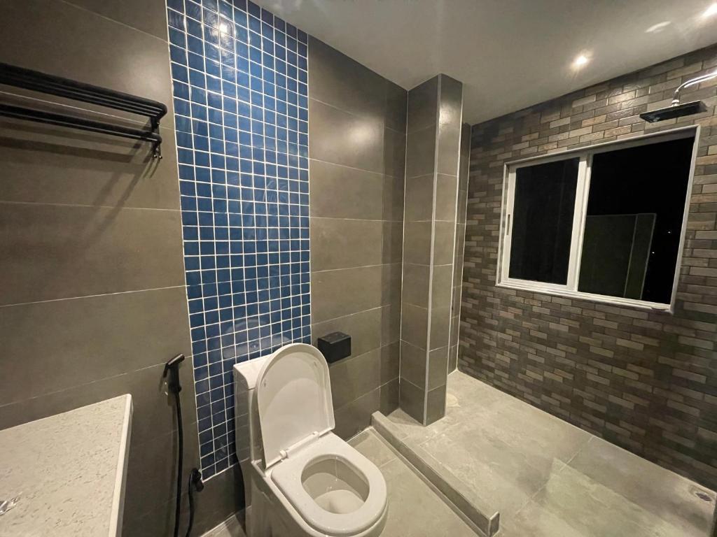Koupelna v ubytování Koimala Hotel