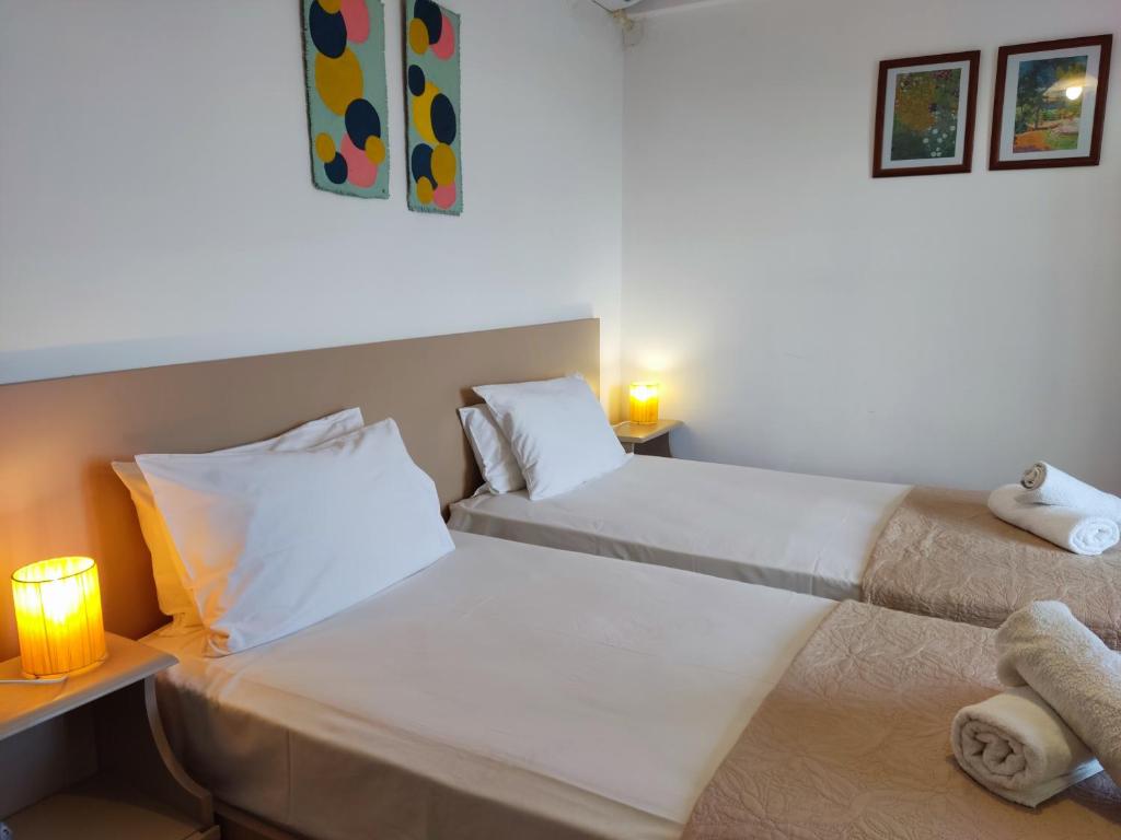 Postel nebo postele na pokoji v ubytování Coral Villas