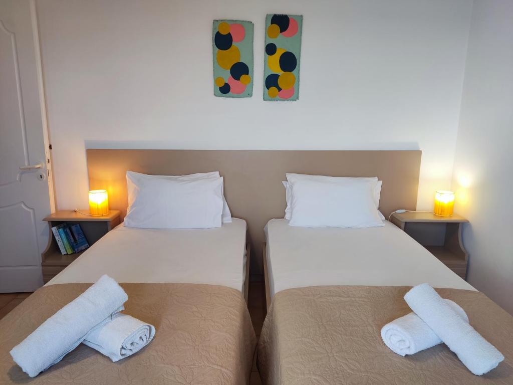 Postel nebo postele na pokoji v ubytování Coral Villas