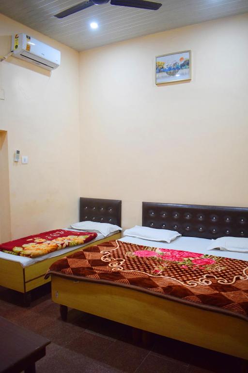 Postel nebo postele na pokoji v ubytování Hotel Golden