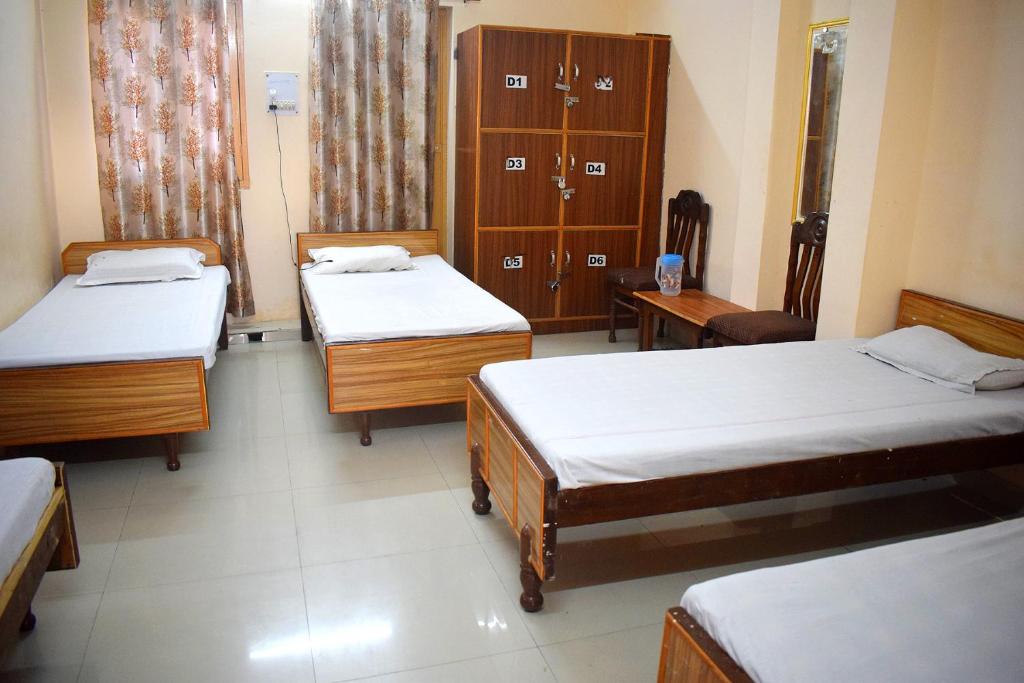 Postel nebo postele na pokoji v ubytování Hotel Golden