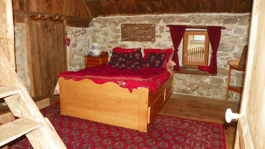 Postel nebo postele na pokoji v ubytování Gite Du Bois De L'ours