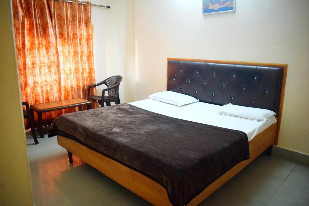 Postel nebo postele na pokoji v ubytování Hotel Golden
