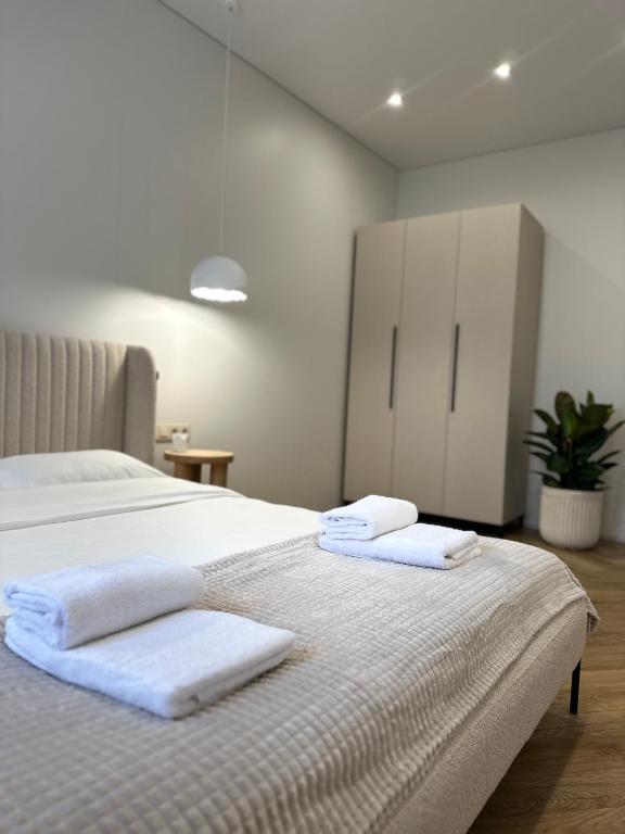 Postel nebo postele na pokoji v ubytování Other Apartments