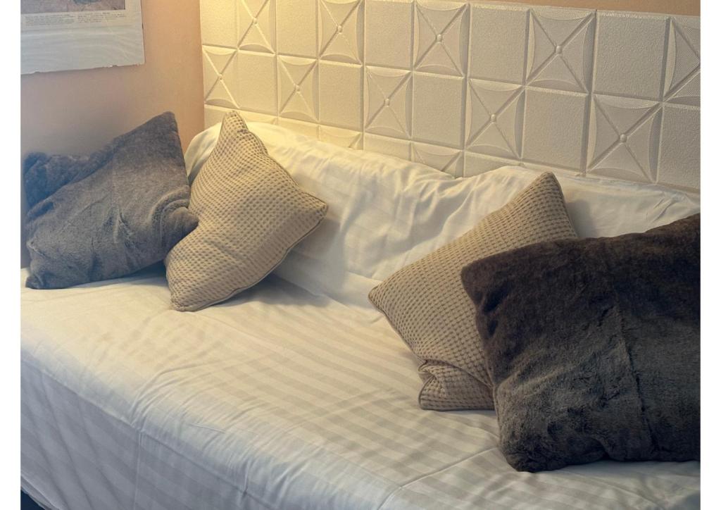 Cama ou camas em um quarto em Appartamenti Sud Ovest By MountainHouses