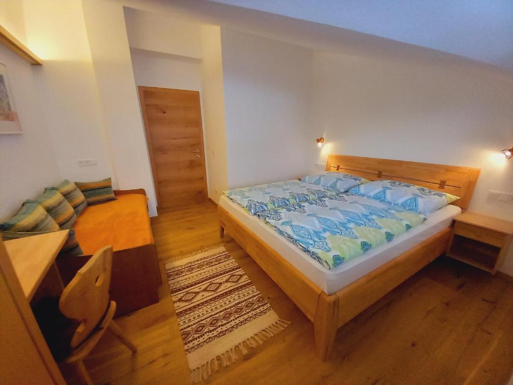 Postel nebo postele na pokoji v ubytování Haus Rosenegg