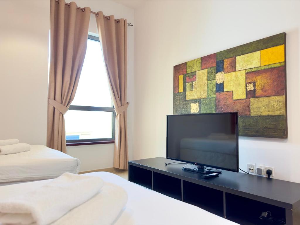 Fotografie z fotogalerie ubytování Dar Vacation - Great Spacious 2BR Apartment in Jumeirah Beach Residence v Dubaji