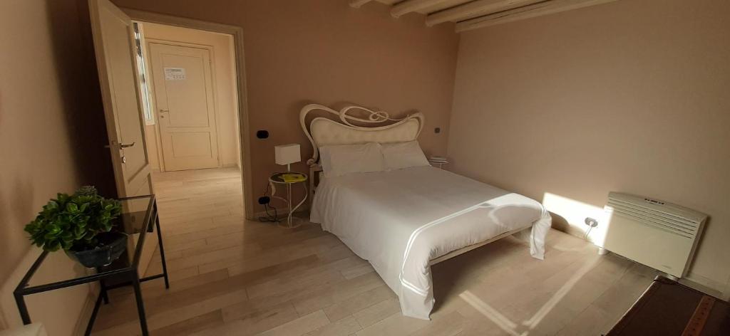 Postel nebo postele na pokoji v ubytování Casale Raffaello B&B Como