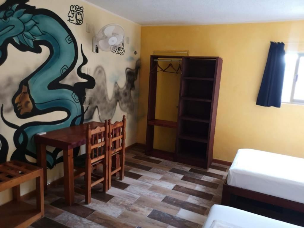 Postel nebo postele na pokoji v ubytování Xcalak Caribe Lodge