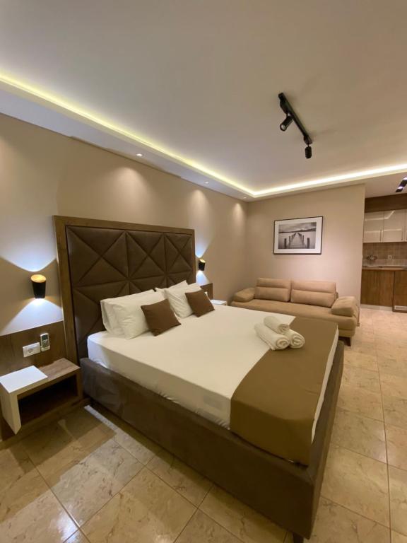 Postel nebo postele na pokoji v ubytování Hotel Comfort & Villas