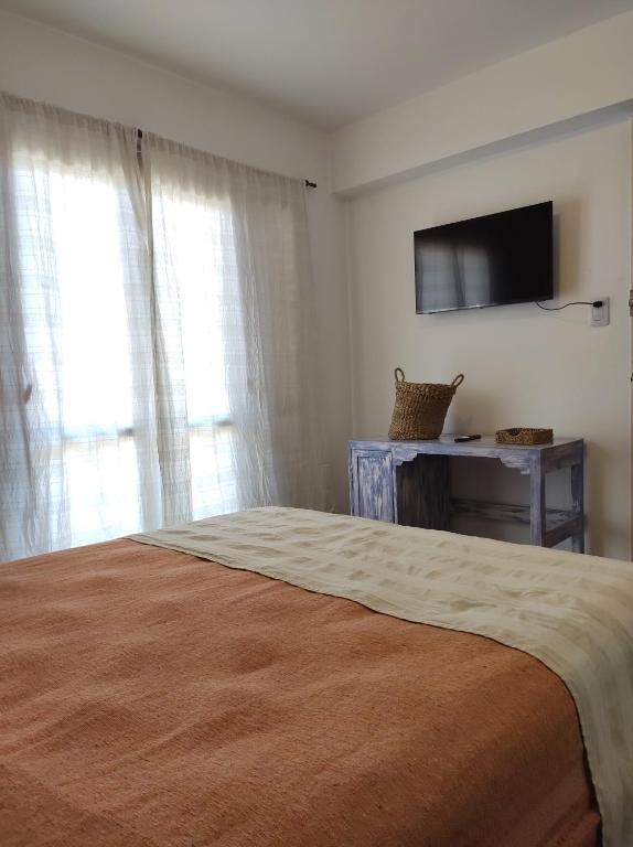 Postel nebo postele na pokoji v ubytování Departemento Alvear.