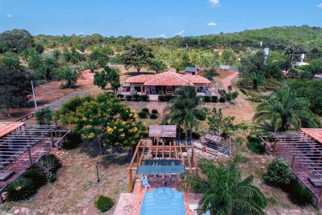 an aerial view of a resort with trees and a building at Paradise Bonito: mansão com piscina in Bonito