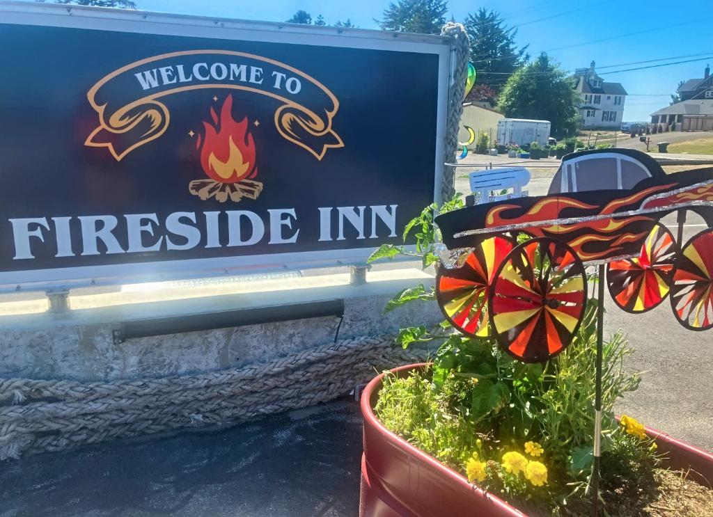 a sign that reads welcome to fireide inn at Fireside Inn in Long Beach