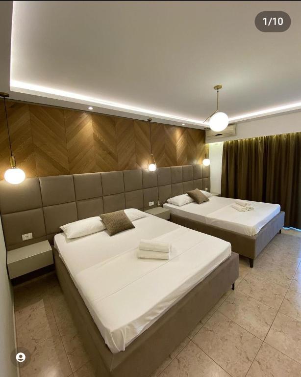 Postel nebo postele na pokoji v ubytování Hotel Comfort & Villas