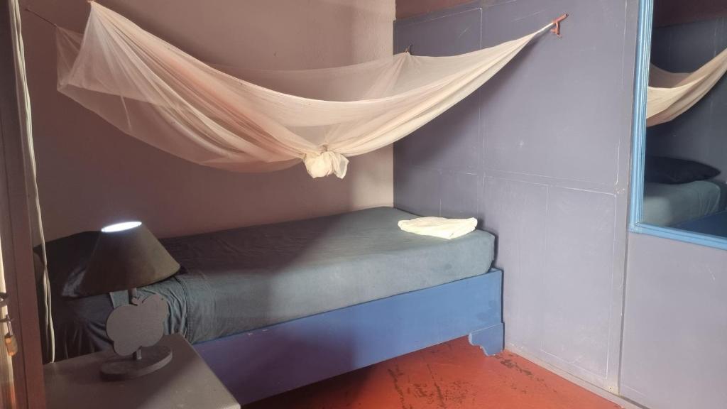 Postel nebo postele na pokoji v ubytování Il Triangolo Hostel