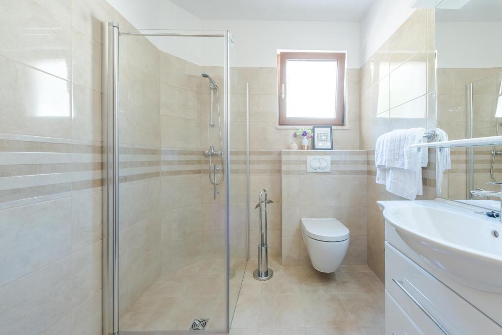 Koupelna v ubytování Apartments Villa Made 4U